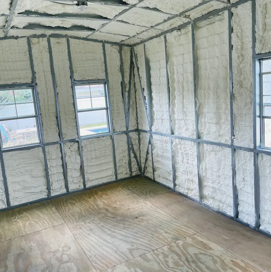 Closed-cell spray foam insulation applied to wall cavities in a residential project in Central Point
